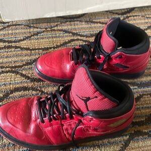 Jordan air one retro 97s in red and black